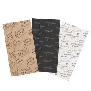 Wrapping paper with Christmas motifs in white and gold, 50x75 cm., ACC22BFW